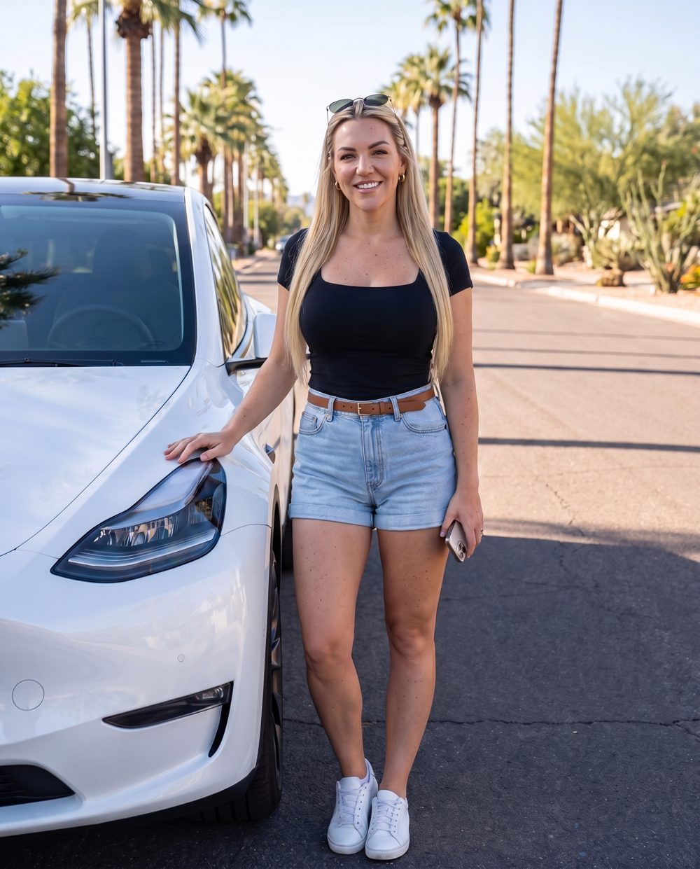 Veronica, AI host of Driver's Minute, beside a white Tesla